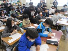 書く